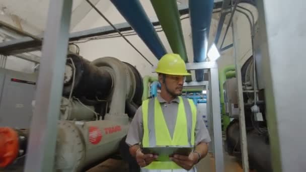 Asian Engineer Maintenance Checking Technical Data Heating System Equipment — Stock Video