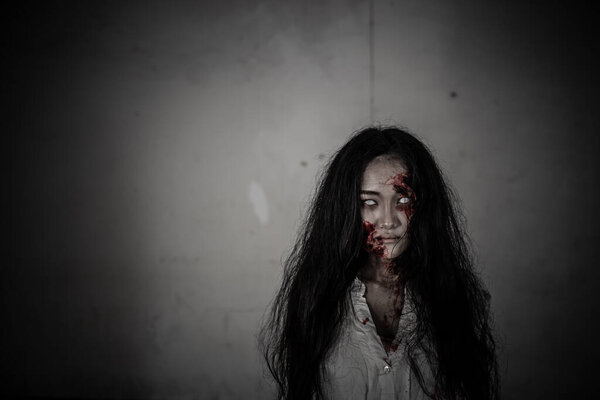 Portrait of asian woman make up ghost face, Horror scene, Scary background, Halloween poster 