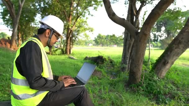 Male Engineer Laptop Checking Object Building New Location Business — Stock Video