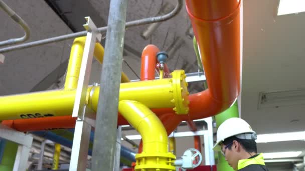 Asian Engineer Wearing Glasses Working Boiler Room Maintenance Checking Technical — Stock Video