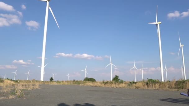 Engineer Working Holding Report Wind Turbine Farm Power Generator Station — Stock Video
