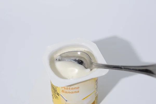 Creamy banana and banana yogurt with spoon — Stock Photo, Image