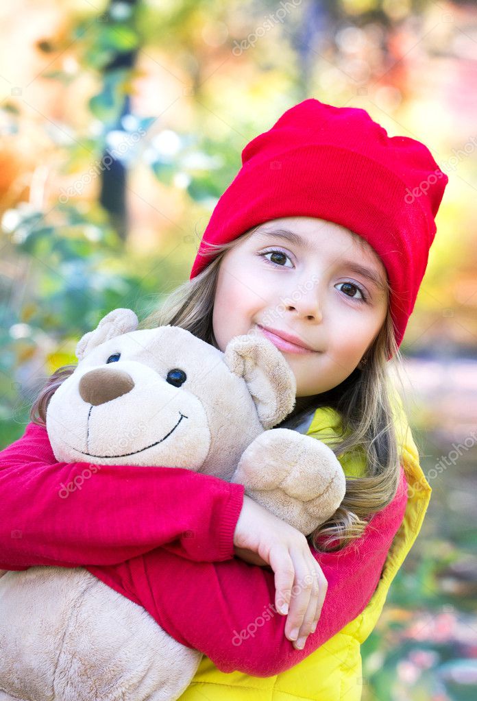 cute baby girl with teddy bear