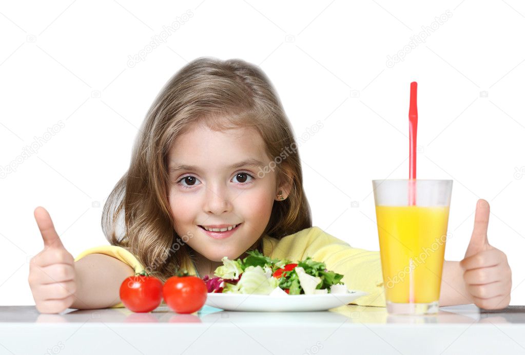 Child eating healthy vegetables food isolated on white.
