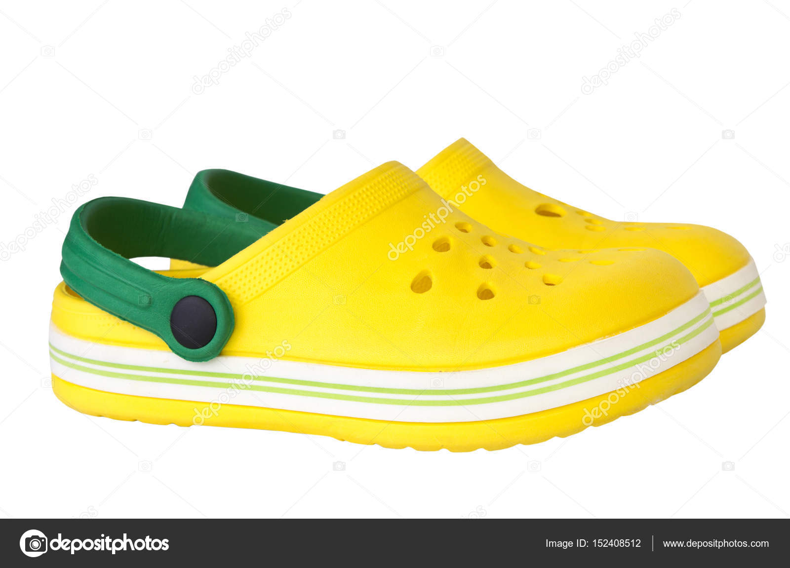 Pair yellow rubber kid's shoes isolated. Stock Photo by ©NYS 152408512