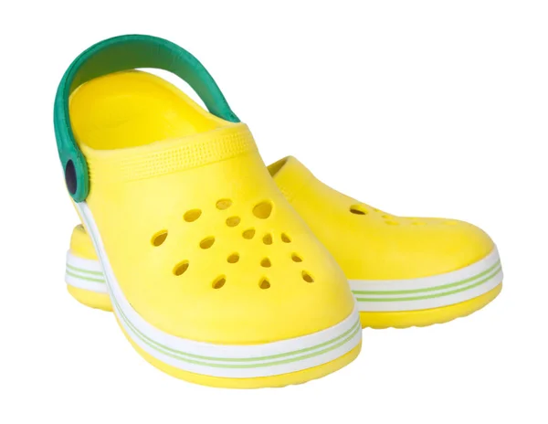 Paar gele rubber kid's schoenen geïsoleerd. — Stockfoto