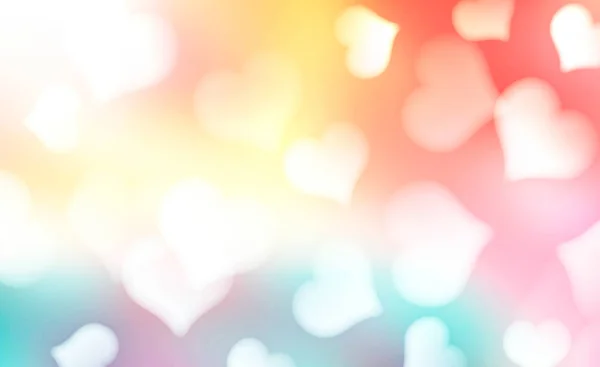 Regenboog kleuren wazig harten achtergrond. — Stockfoto