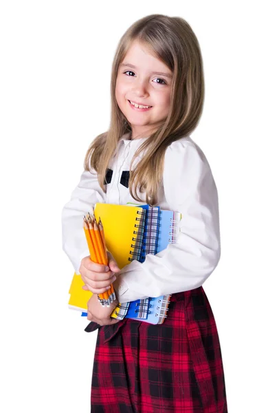 Σχολείο κορίτσι παιδί με σχολικά είδη που απομονώνονται σε λευκό. — Φωτογραφία Αρχείου