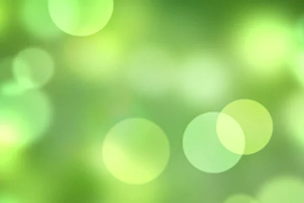 Fondo de luces brillantes borrosas verdes . — Foto de Stock