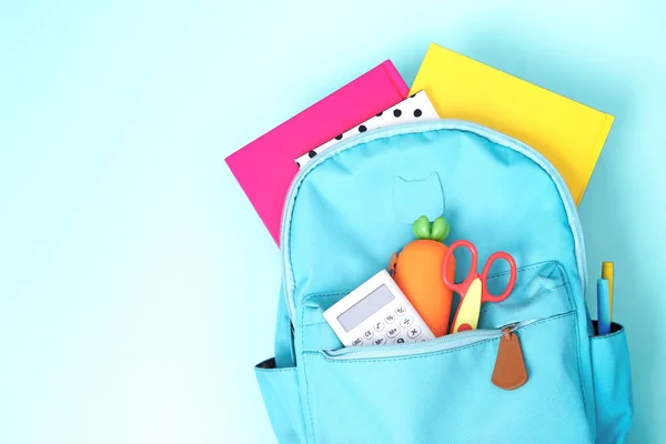 Blue school bag, backpack with accessories empty space . — стоковое фото