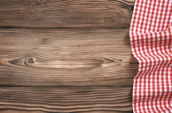 Czerwony Kratkę Tkanina Kuchenna Ciemnym Drewnianym Tle Blat Ozdobiony Ręcznikiem — Zdjęcie stockowe