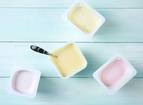 Yogurt Top View Wooden Table Different Colors Yoghurts Milk Dessert — Stock Photo, Image