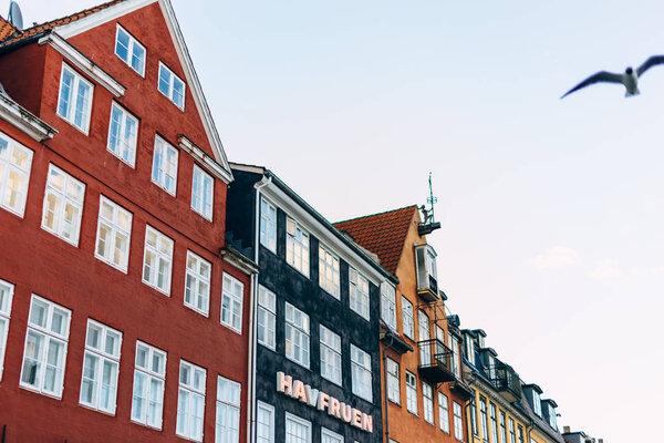Copenhagen, Denmark. Nyhavn is one of the most recognizable places in Copenhagen. Summer sunset in Copenhagen.
