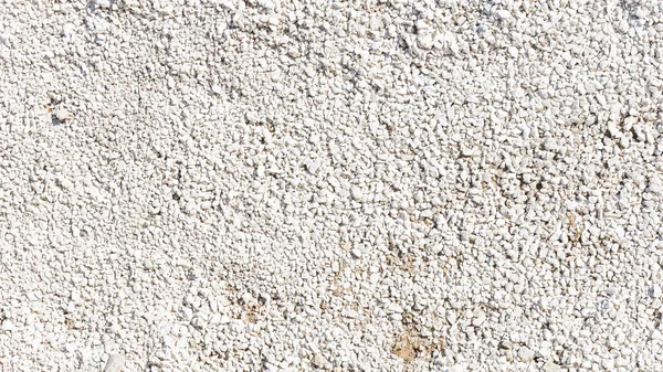 Light fine gravel on the street — Stock Photo, Image