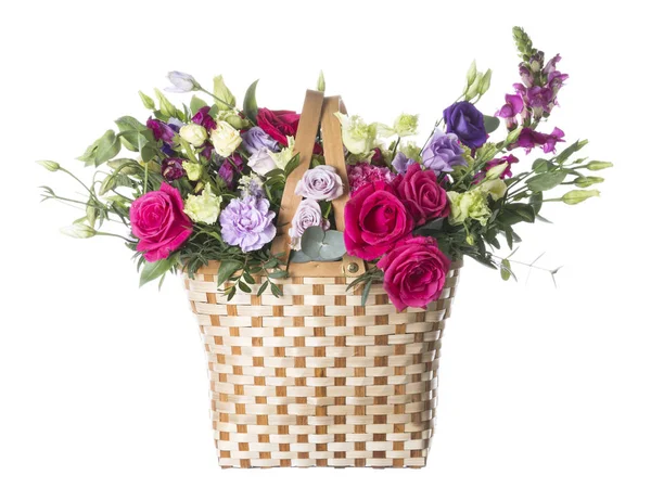 Basket with flowers on a white background — Stock Photo, Image
