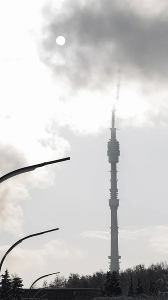 Fantastic unusual shadow from the Ostankino tower on snowy cloud — Stock Photo, Image