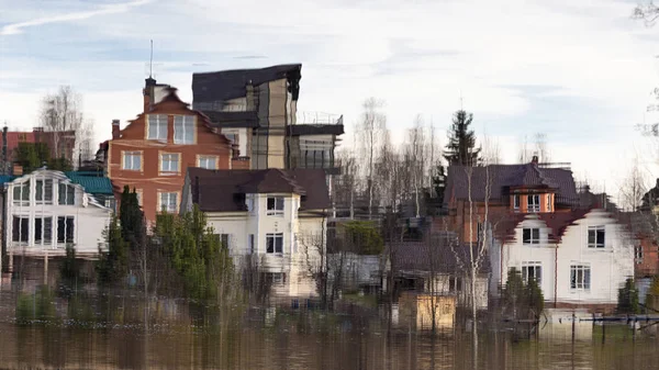 Reflection of cottages in the water — Stock Photo, Image