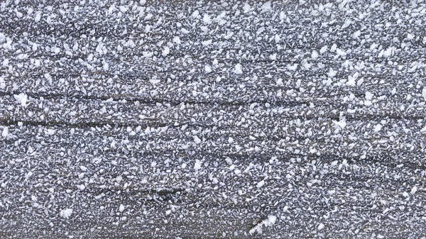Białe kryształy lodu na powierzchni — Zdjęcie stockowe