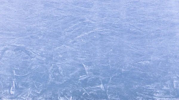 Traces of runners on bright ice — Stock Photo, Image
