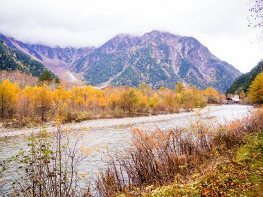 The fall season of kamikochi, in Hotaka Ranges, Kamikochi, Japan. clipart