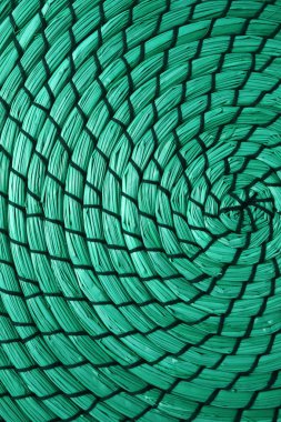 Örülmüş suyun dikey görüntüsü sümbül basamaklı paspasın soyut deseni nane yeşili renkte