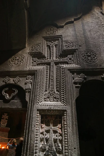 Cross and Another Carving Motifs on the Cave Wall inside Ancient Rock-cut Church of Geghard Monastery Complex, Armenia