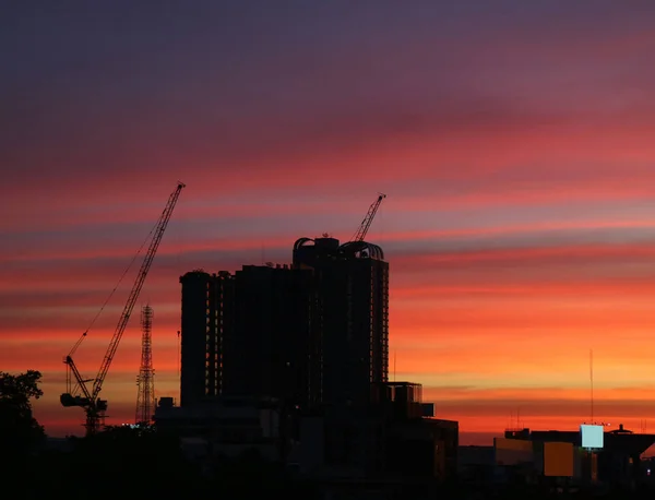 Silhouette Constructing Buildings Marvelous Colorful Sunset Sky — Stock Photo, Image