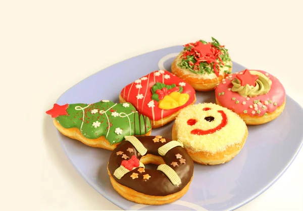 Various Design Colorful Christmas Decorated Doughnuts Sweets Light Blue Plate — Stock Photo, Image