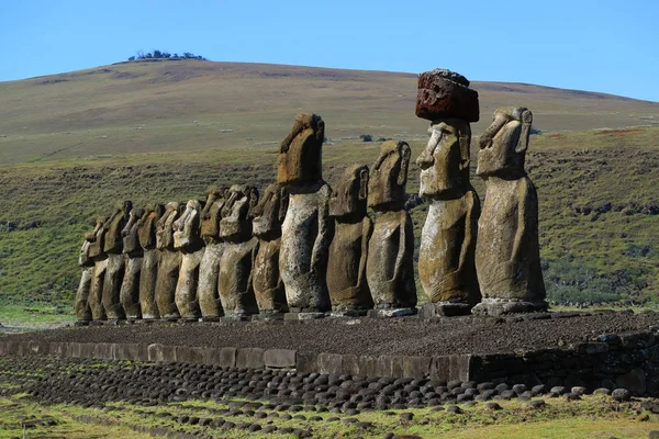 stock image The giant Moai statues of Ahu Tongariki with Poike volcano in background, Archaeological site in Easter Island, Chile