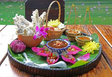 Set of Fresh Lotus Petal Wrapped Appetizer and Crispy Fried Rice Cakes with Spicy Dips clipart