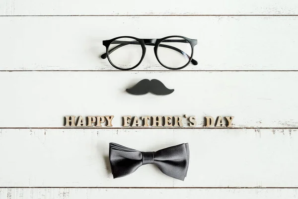 Happy Father's Day wooden letters with glasses and mustache — Stock Photo, Image