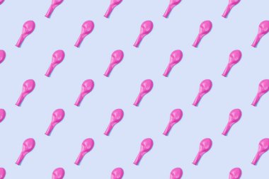 Pembe kauçuk şişmemiş balonlar