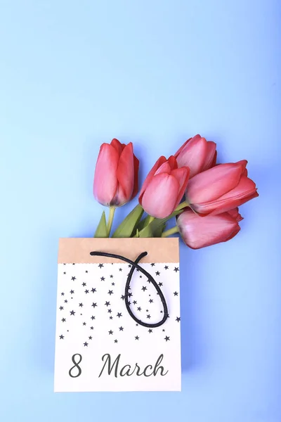 Bunch Spring Tulip Flowers Paper Bag Blue Background Easter Day — Stock Photo, Image