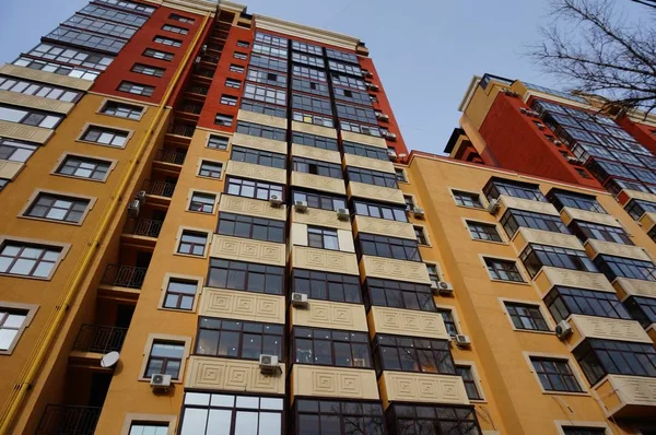 Beautiful colored residential buildings in the city center. Buildings and urban architecture.