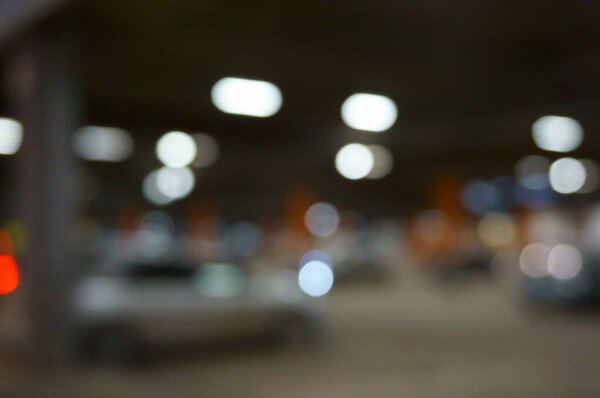 Blurred background. Parking near the shopping center.