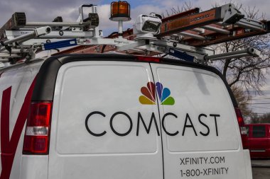 Indianapolis - Circa February 2017: Comcast Service Vehicle. Comcast is a Multinational Mass Media Company XI clipart