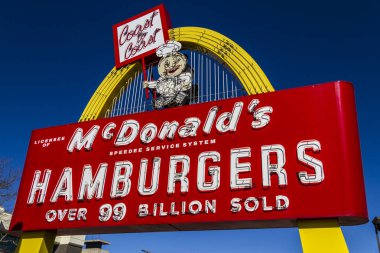 Muncie - Circa March 2017: Legacy McDonald's Hamburger Sign with Speedee. This Sign was Installed in 1956 and Restored in 2013 IX clipart