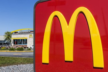 Indianapolis - Circa May 2017: McDonald's Restaurant Location. McDonald's is a Chain of Hamburger Restaurants XI clipart