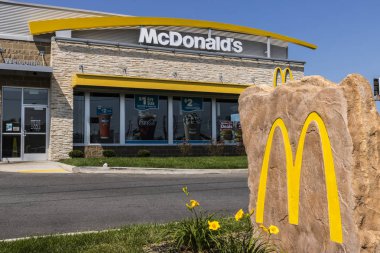 Kokomo - Circa August 2017: McDonald's Restaurant Location. McDonald's is a Chain of Hamburger Restaurants XII clipart