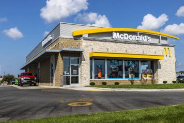 Kokomo - Circa August 2017: McDonald's Restaurant Location. McDonald's is a Chain of Hamburger Restaurants XIII clipart
