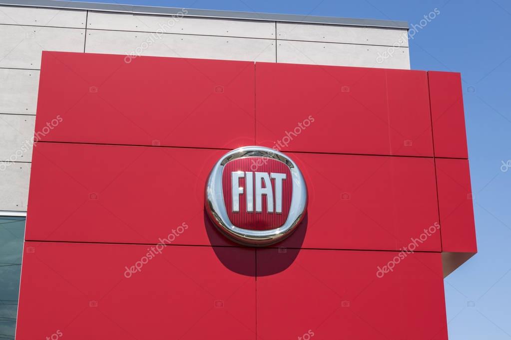 Indianapolis - Circa August 2017: Logo and signage of local Fiat dealership. Fiat is part of FCA and sells both 500 and Abarth vehicles I