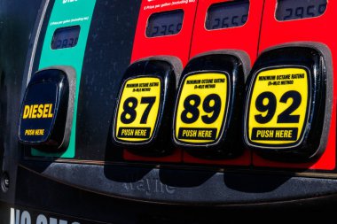 Indianapolis - Circa March 2018: Gas Station Pumps with choice of Diesel, 87 octane, 89 octane or 93 octane II clipart