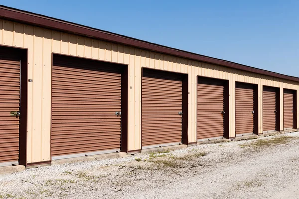 Brown numbered self storage and mini storage garage units III