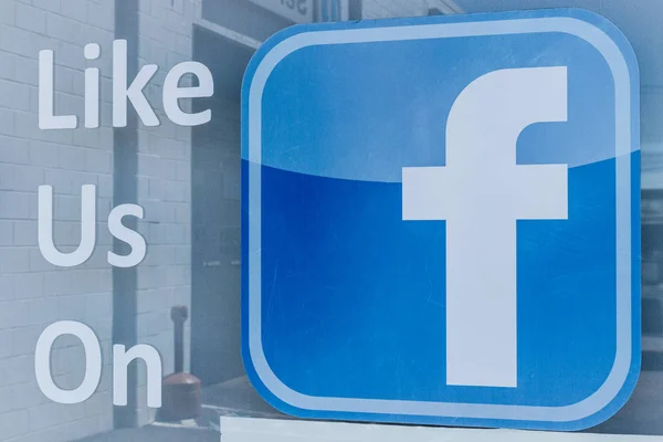 Lafayette - Circa April 2018: Facebook logo asking for likes outside a business. Facebook has been under scrutiny for their data and privacy issues I — Stock Photo, Image