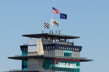 Indianapolis - Circa May 2018: The Panasonic Pagoda flying the American flag at Indianapolis Motor Speedway. IMS Prepares for the 102nd Running of the Indy 500 XII clipart