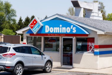 Peru - Circa May 2018: Domino's Pizza Carryout Restaurant. Dominos is consistently one of the top five companies in terms of online transactions II clipart