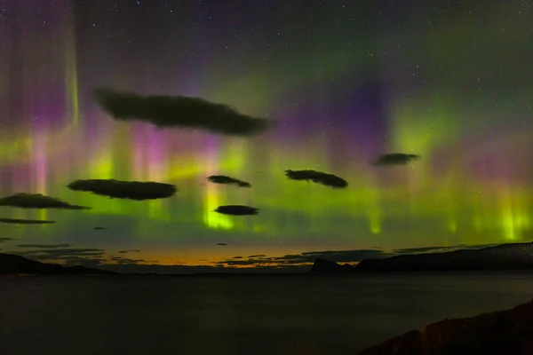 aurora borealis, polar lights, over mountains in the North of Europe - Lofoten islands, Norway