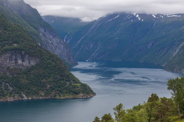 Observation place with amazing view to Geiranger fjord Norway in cloudy weather, selective focus. — 스톡 사진