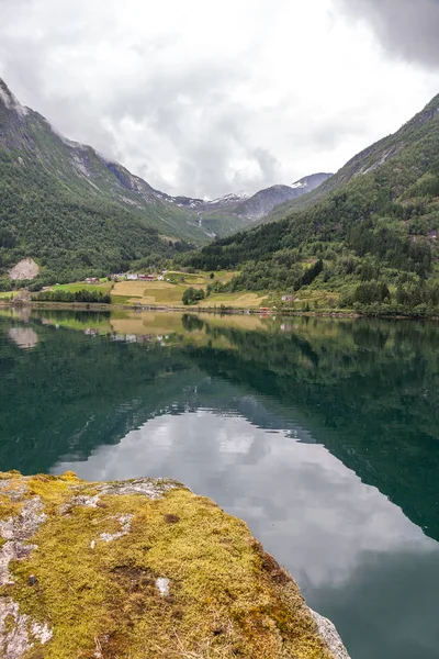 Beautiful Norwegian landscape. view of the fjords. Norway ideal fjord reflection in clear water. selective focus — 스톡 사진