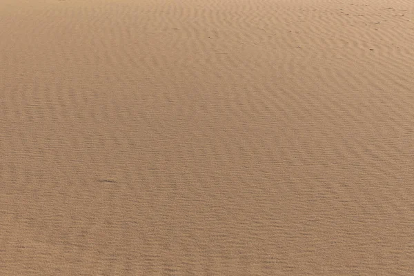 Sandstruktur Sandstrand Als Hintergrund Ansicht Von Oben Selektiver Fokus — Stockfoto